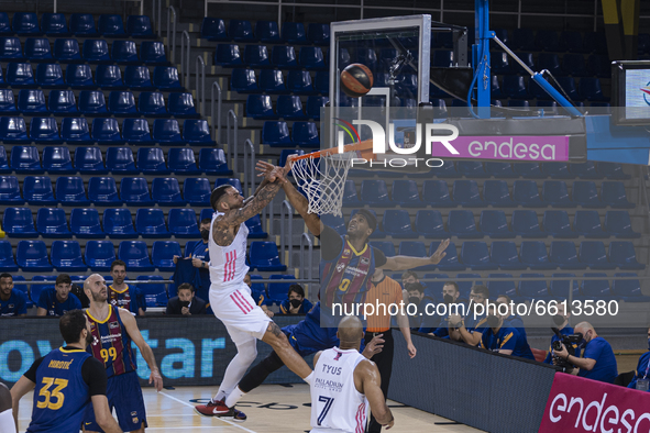 Brandon Davies (0) of Barça and Jeffery Taylor (44) of Real Madrid during the Barça vs Real Madrid match of ACB league on April 11, 2021, in...