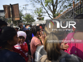 Nepalese people observing Ghode Jatra or the 'Festival of Horse' through the Iron Bar at the Army Pavilion, Kathmandu, Nepal on Sunday, Apri...