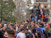 Illinois Fighting Illini students celebrate in Campustown on Green Street and at the Alma Mater after defeating the Ohio State Buckeyes in t...