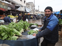Syrians shopping for the month of fasting at a popular market in the city of Idlib, northwestern Syria on April 12, 2021. Several Arab and I...