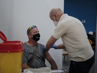 A man getting the vaccine against covid-19 in Pisa, Italy, on April 12, 2021. The campaign for vaccination against Covid-19 rolling out in I...