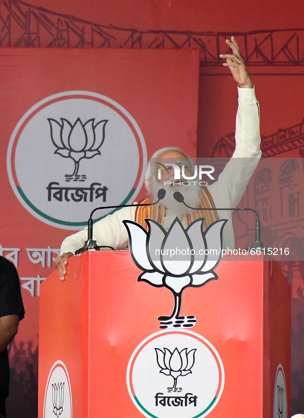 Indian  Prime Minister Narendra Modi deliver his speech to the supporters  of  Bharatiya Janata Party (BJP) during a mega  rally ahead of th...
