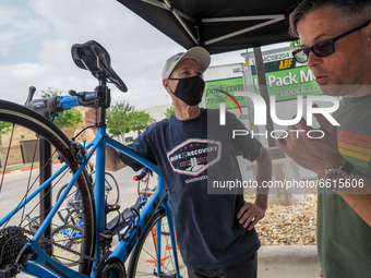 Mechanics from Project HERO are seen as they begin to assemble bicycles for the participants of the 2021 Texas Challenge; a six-day, 300 mil...