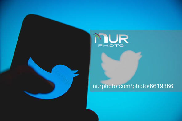 In this photo illustration Twitter logo is displayed on a smartphone screen in Athens, Greece on April 14, 2021. 