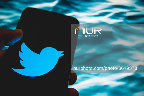 In this photo illustration Twitter logo is displayed on a smartphone screen in Athens, Greece on April 14, 2021. 