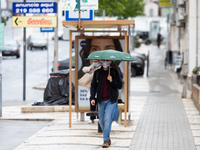 A man using umbrella to protect yourself from bad weather in Lisbon, Portugal, on April 26, 2021.
Lola Storm hits Portugal with winds and he...