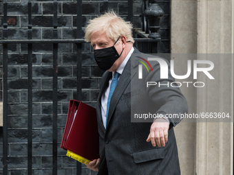 LONDON, UNITED KINGDOM - APRIL 28, 2021: British Prime Minister Boris Johnson leaves 10 Downing Street for PMQs at the House of Commons, on...