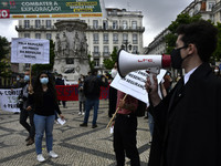 Students wearing protective masks march through the streets of Lisbon to demand their rights as students. April 28, 2021. Demonstrators from...