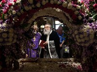 The time of the dethronement of Christ from the cross in  the church of Saint Panteleimon of Acharnai in Athens, Greece, on April 30, 2021....