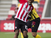  Ivan Toney of Brentford and Adam Masina of Watford battle for the ball during the Sky Bet Championship match between Brentford and Watford...