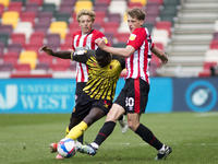  Ken Sema of Watford and Mads Roerslev of Brentford battle for the ball during the Sky Bet Championship match between Brentford and Watford...