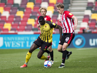  Ken Sema of Watford and Mads Roerslev of Brentford battle for the ball during the Sky Bet Championship match between Brentford and Watford...