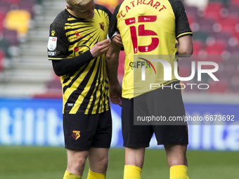  Will Hughes of Watford and Craig Cathcart of Watford stands during the Sky Bet Championship match between Brentford and Watford at the Bren...
