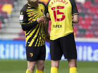 Will Hughes of Watford and Craig Cathcart of Watford stands during the Sky Bet Championship match between Brentford and Watford at the Bren...
