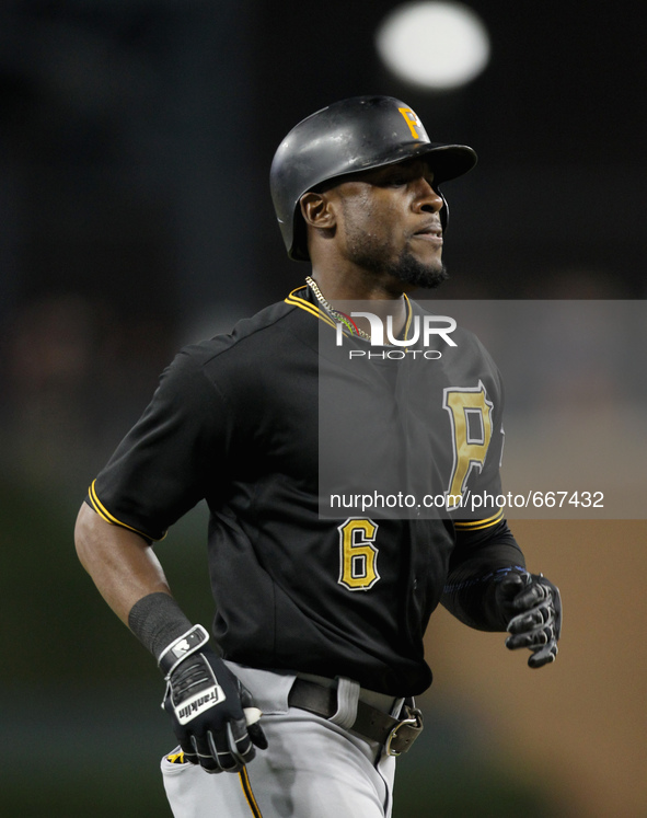 Pittsburgh Pirates' Starling Marte rounds the bases after his solo home run in the eighth inning of a baseball game against the Detroit Tige...