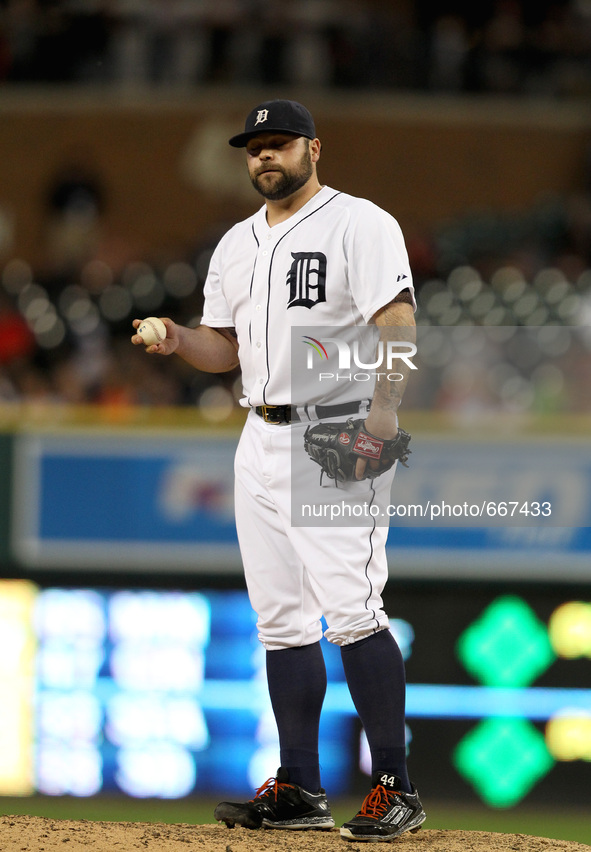 Detroit Tigers closer Joba Chamberlain reacts after giving up his second home run against the Pittsburgh Pirates in the eighth inning of a b...