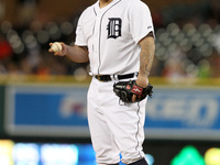 Detroit Tigers closer Joba Chamberlain reacts after giving up his second home run against the Pittsburgh Pirates in the eighth inning of a b...