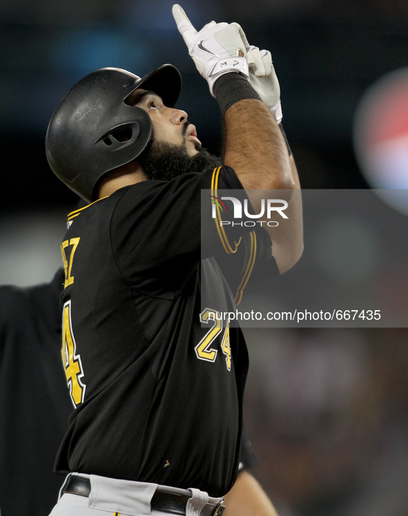 Pittsburgh Pirates' Pedro Alvarez reacts after his solo home run in the eighth inning of a baseball game against the Detroit Tigers in Detro...