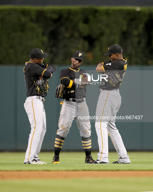Pittsburgh Pirates Starling Marte, left, Andrew McCutchen,center, and Gregory Polanco, right, celebrate the 9-3 victory over the Detroit Tig...