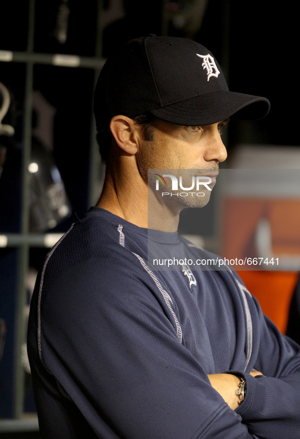 Detroit Tigers manager Brad Ausmus follows the ninth inning of a baseball game against the Pittsburgh Pirates in Detroit, Michigan USA, on W...