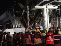 Rescuers carry out work to rescue the bodies of the victims who lost their lives in the accident of the subway of line 12 of Olivos station,...