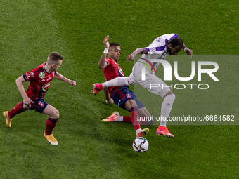 Alef of MOL Fehérvár competes for the ball with Junior Tallo of Újpest FC during the MOL Hungarian CUP Final 2021 match between Fehervár and...