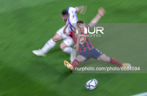 Adrian Rus of MOL Fehérvár competes for the ball with Nikola Mitrovics of Újpest FC during the MOL Hungarian CUP Final 2021 match between Fe...