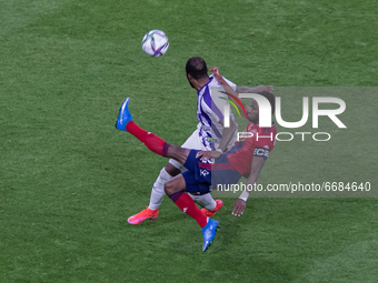 Stopira of MOL Fehérvár competes for the ball with Junior Tallo of Újpest FC during the MOL Hungarian CUP Final 2021 match between Fehervár...