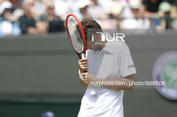 (150702) -- WIMBLEDON, July 2, 2015 () -- Robin Haase of the Netherlands reacts during the men's singles second round against Andy Murray of...