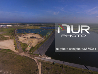 An aerial view of the partially drained New Gypsum Stack South wastewater reservoir at Piney Point in Palmetto, Florida Tuesday, May 4, 2021...