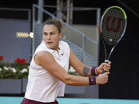 Aryna Sabalenka of Belarus in action during her quarterfinal match against Elise Mertens of Belgium during day seven of the Mutua Madrid Ope...