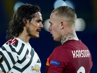 Edinson Cavani of Manchester United argues with Rick Karsdorp of AS Roma during the UEFA Europa League Semi-Final match between AS Roma and...