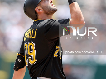 Pittsburgh Pirates' Francisco Cervelli celebrates his solo home run in the fourth inning of a baseball game against the Detroit Tigers in De...