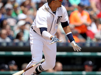 Detroit Tigers' Victor Martinez hits a single in the fourth inning of a baseball game against the Pittsburgh Pirates in Detroit, Michigan US...