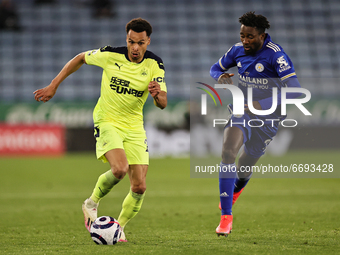Jacob Murphy of Newcastle United runs with the ball watched by Wilfred Ndidi of Leicester City during the Premier League match between Leice...