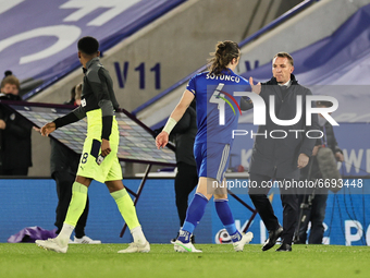 Manager of Leicester City Brendan Rodgers (far right) interacts with Caglar Soyuncu of Leicester City after the final whistle during the Pre...