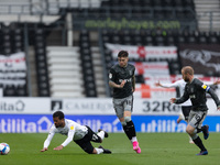 Nathan Byrne of Derby County is bowled over by Josh Windass of Sheffield Wednesdayduring the Sky Bet Championship match between Derby County...