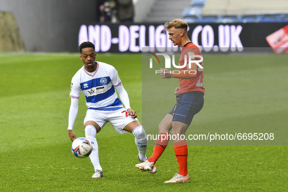 Kiernan Dewsbury-Hall of Luton town battles for possession with Chris Willock of QPR during the Sky Bet Championship match between Queens Pa...