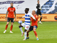 Osman Kakay of QPR battles for possession with Kal Naismith of Luton town during the Sky Bet Championship match between Queens Park Rangers...