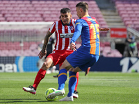 Angel Correa and Clement Lenglet during the match between FC Barcelona and Club Atletico Madrid, corresponding to the week 35 of the Liga Sa...