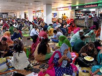 People taking Iftar without maintaining social distance at Bashundhara City Shopping Complex in Dhaka, Bangladesh on May 09, 2021. (