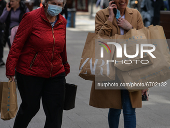 People carrying shopping bags seen on Hennry Street in Dublin.
After five months of strict lockdown, the first stage of defrosting the Irish...