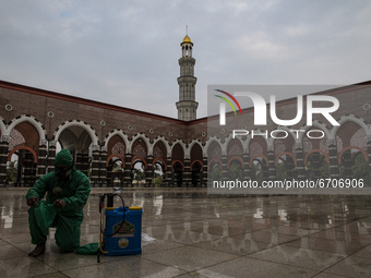 Desinfectan spraying at Gold Mosque in Depok, West Java, Indonesia on May 12, 2021 ahead Eid Fitr preparation. Muslim in Indonesia can pray...