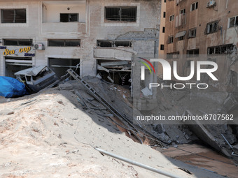 General view of the damage residential building after it was hit by Israeli airstrikes amid the escalating flare-up of Israeli-Palestinian v...