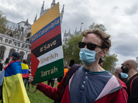  Demonstrators protest outside Parliament in London, UK, on May 11, 2021 against the Colombian government after hundreds of people were inju...