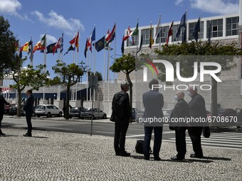People gather near the entrance of the Portuguese presidency of the European Parliament in Belem, Lisbon.  15 May 2021. The European Parliam...