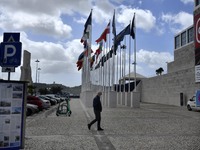 A man walks near the flag square of the Portuguese presidency of the European Parliament, in Belem, Lisbon. 15 May 2021. The European Parlia...