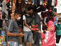  People not maintaining any social distance while shopping ahead of Eid-Al-Fitr, during the Covid-19 pandemic  in Nagaon District of Assam,i...