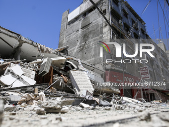 Al-Walid building which was destroyed in an Israeli airstrike on Gaza city, on May 13, 2021.  (