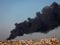Smoke rises amid a flare-up of Israeli-Palestinian violence, in Gaza May 15, 2021. (
